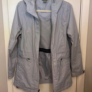 Grey rain jacket with lots of storage